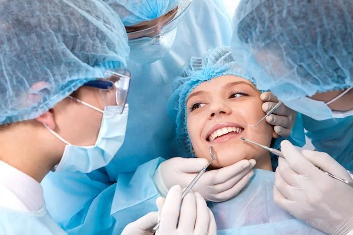 Dental team treating a patient