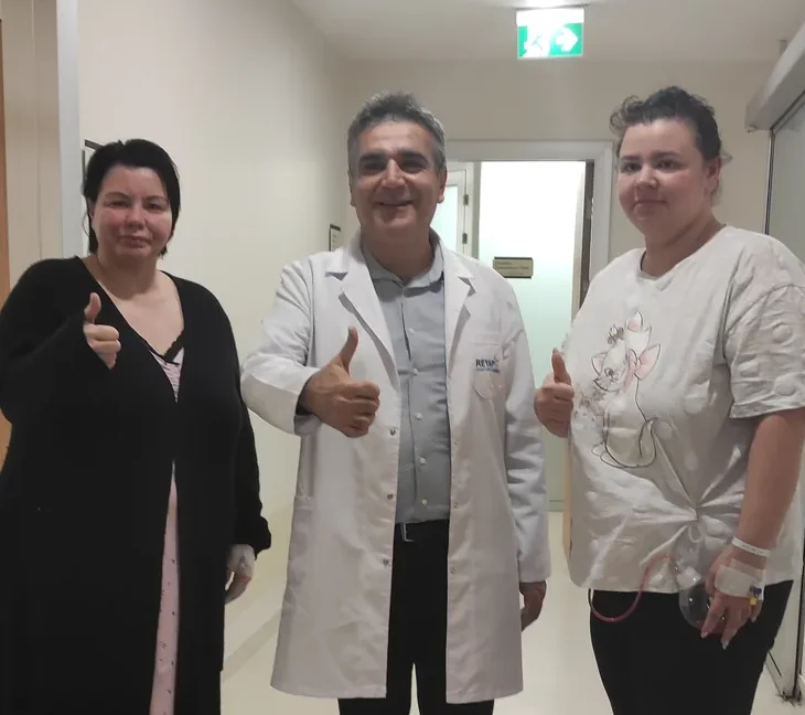 Patients with the medical team after treatment